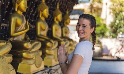 young woman visiting a temple in Colombo, Sri Lankaman visiting a temple in Colombo, Sri Lanka